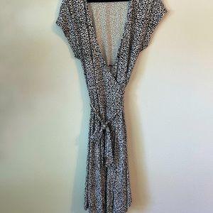 Black and white spotted wrap dress